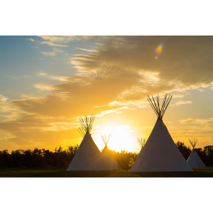 Teepees at sunset
