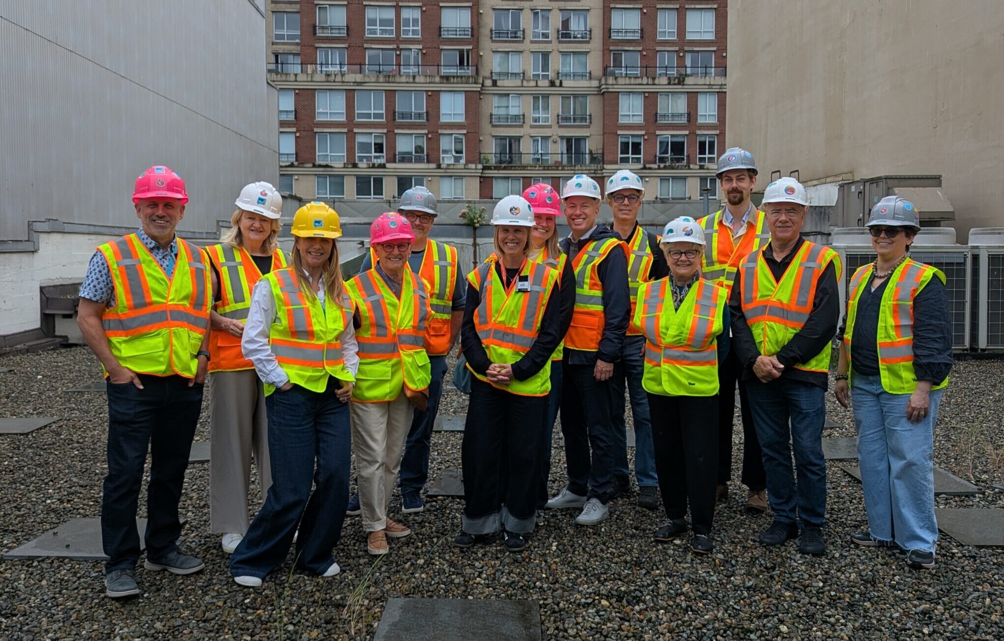 Entrepreneurial Philanthropy - Donor tour of Foundry - folks in yellow vests and hard hats.